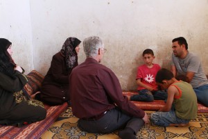 David Hall visits a patient at home. (Bob Haynes photo)