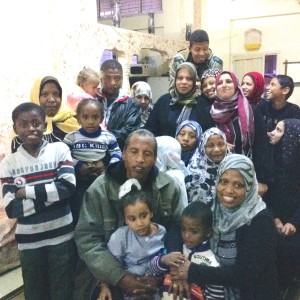 The women's group and their families. (Photo by Bob Haynes)